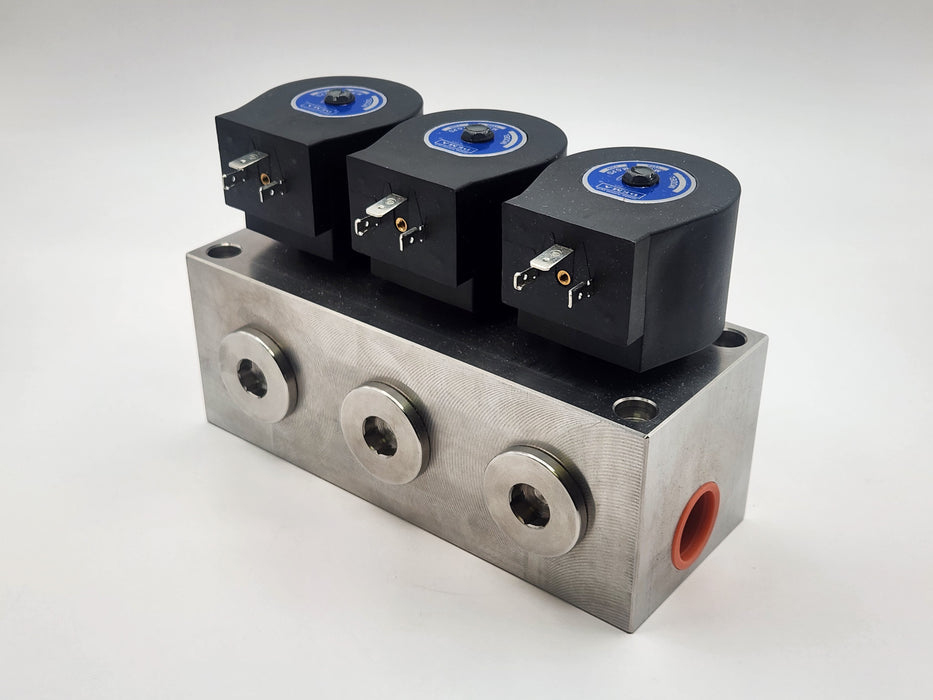 DEMA SS High Pressure Manifold Valve, 3 Station, Non-Metering, NC, 3/4" NPT 1200 PSI 24VDC DIN Coils